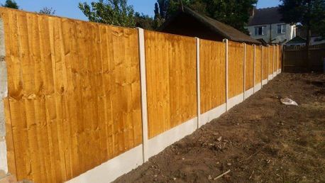 wood and lap panel fencing