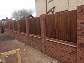 modern brick and wood fencing